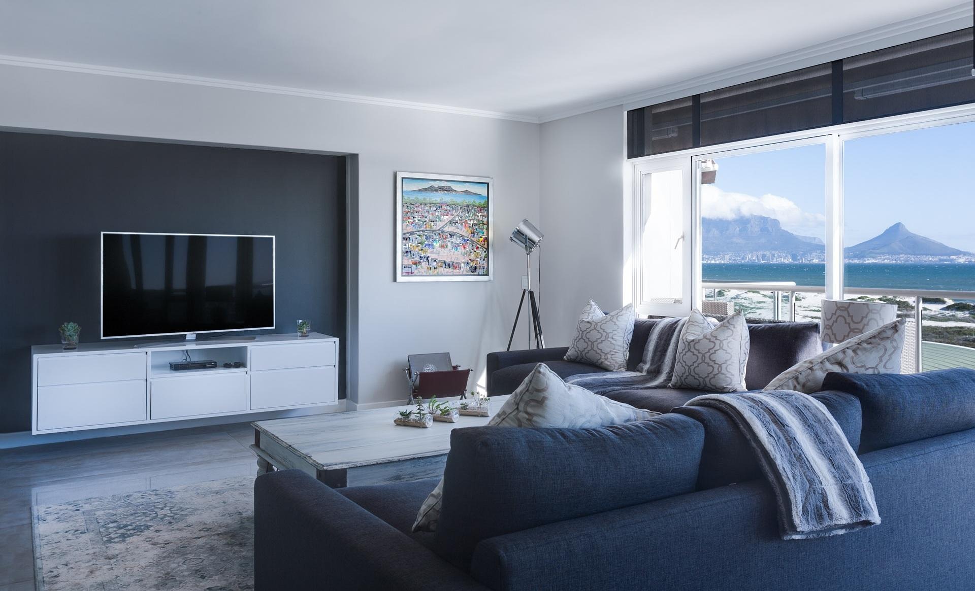 Bright, guest-ready living room in a Constantia property